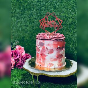 A combination of mauve , purple and off white Watercolour cake