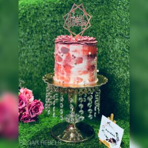 A combination of mauve , purple and off white Watercolour cake